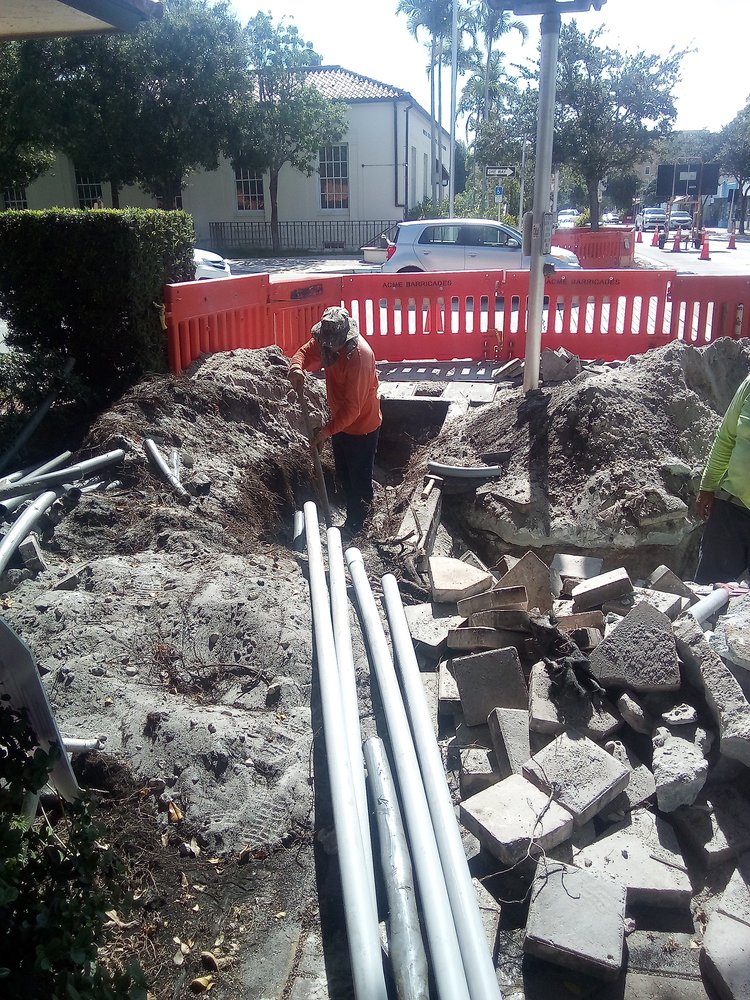 Contractor open trenching for pedestrian pole bases   October 2024