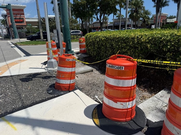 Reconstruction of the sidewalk land pedestrian ramp on Tropic Blvd and SR 5   April 2025