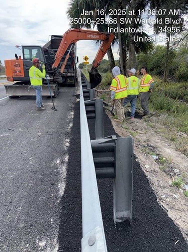 Misc. asphalt placed for installed guardrail pad on right roadway, Jan. 2025